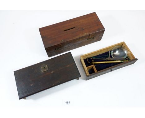 A set of balance scales boxed, an offetary or money box 