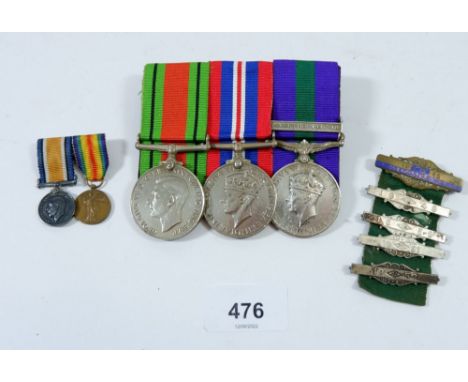 A WWII pair of medals mounted with a commemorative medal to GDSM K. Leer Grenadier Guards 2527185, various bar badges and two