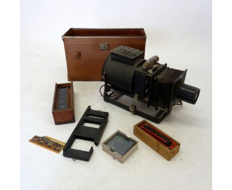 A Magic lantern and various slides including WWI and childrens, Cox's etc 