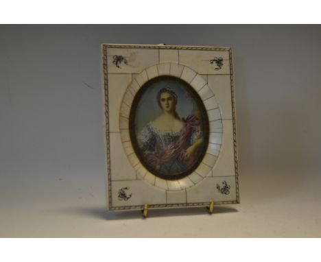 A late 19th century portrait miniature of an elegant young lady 