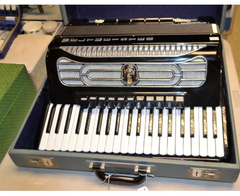 A Weltmeister Supira piano accordion, cased Condition Report: Please see attached images for examples of condition