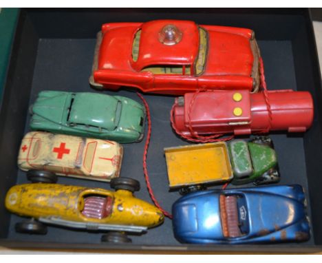 Tinplate Toys - a Japanese Kaname Sangyo remote control Fire Chief Car, red tin body, yellow printed interior, flashing roof 