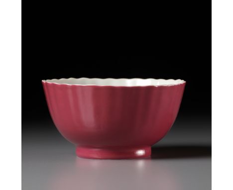 A RARE FAMILLE ROSE RUBY-PINK ENAMELED PETAL-LOBED BOWL, YONGZHENG PERIODChina, 1723-1735. The deep rounded sides supported o