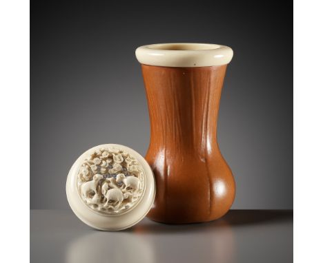 AN IVORY AND GOURD 'SANYANG' CRICKET CAGE, QING DYNASTYChina, 18th-19th century. The bulbous base is surmounted by a tall fla
