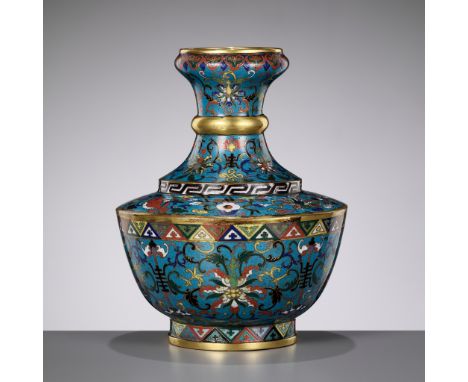 A GILT CLOISONNE ENAMEL 'BAJIXIANG' VASE, CHINA, EARLY 19th CENTURYThe exterior brightly enameled on a deep turquoise ground 