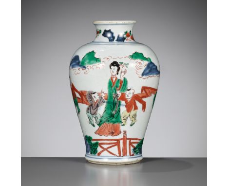 A WUCAI 'LADY WITH BOYS' VASE, MEIPING, 17TH CENTURYChina. The baluster body supported on a short foot and rising to a waiste