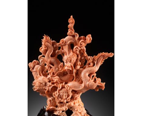 A SUPERB CORAL CARVING OF A DRAGON IN FRONT VIEW, LATE QING DYNASTY TO REPUBLIC PERIODExpert's note: Coral carvings of figure