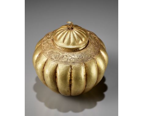 A RARE GOLD REPOUSSE MELON-FORM JAR AND COVER, TANG DYNASTYChina, 618-907. The lobed sides of the vessel supported on a sligh