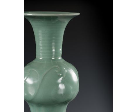 A SMALL LONGQUAN CELADON PHOENIX TAIL VASE, YENYEN, SOUTHERN SONG TO YUAN DYNASTYChina, 12th-13th century. Delicately carved 