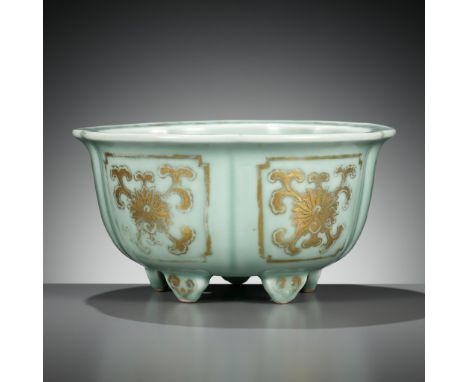 A MOLDED, LOBED AND GILT CELADON-GLAZED JARDINIERE, QIANLONG MARK AND PERIODChina, 1736-1795. Exquisitely potted with lobed s