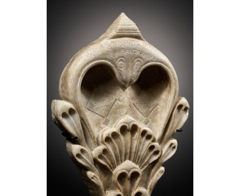 AN INSCRIBED NAGA FRAGMENT FROM A JAIN TEMPLE, WESTERN INDIA, 15TH-17TH CENTURYDeeply and skillfully carved from pure white m