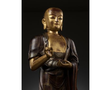 A LARGE AND HIGHLY IMPORTANT ZITAN AND GILT-LACQUERED STATUE OF SARIPUTRA, THE FIRST OF BUDDHA'S TWO CHIEF DISCIPLES, CHINA, 