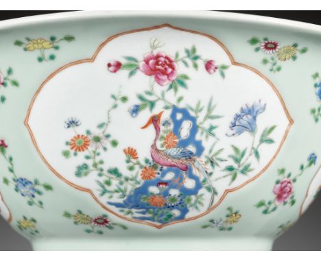 A CELADON-GLAZED FAMILLE ROSE 'HUNDRED ANTIQUES' PORCELAIN BOWL, QING DYNASTYChina, 18th - early 19th century. The large bowl