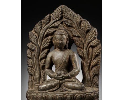 A LIMESTONE FIGURE OF BUDDHA AMITABHA UNDER THE BODHI TREE, NEPAL, 17TH-18TH CENTURYSeated in vajraparyankasana on a double l