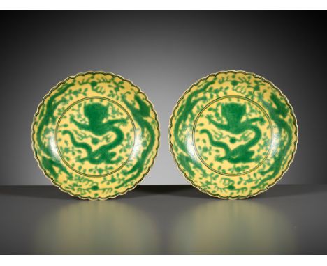 A PAIR OF YELLOW-GROUND AND GREEN-ENAMELLED 'DRAGON' DISHES, QIANLONG MARK AND OF THE PERIODChina, 1736-1795. Delicately pott