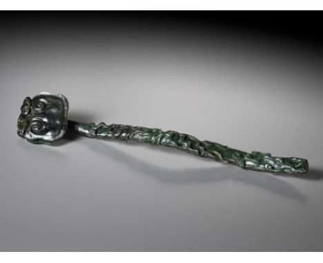 A SPINACH-GREEN JADE 'LINGZHI AND FINGER CITRON' RUYI SCEPTER, CHINA, 18TH CENTURYFinely carved, the scepter with a flattened