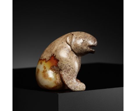 AN EXCEPTIONAL YELLOW JADE FIGURE OF A BEAR, HUANGXIONG, HAN DYNASTY, CHINA, 202 BC - 220 ADExpert's note: At peace with itse