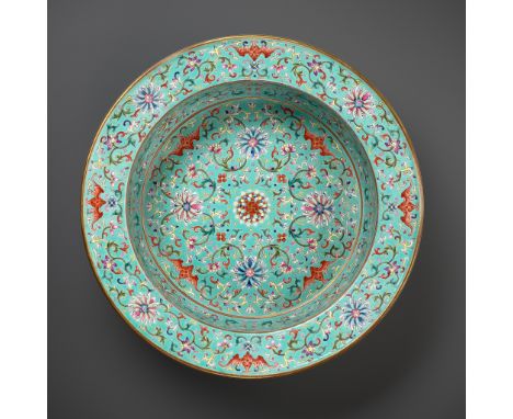 A TURQUOISE-GROUND GILT-DECORATED FAMILLE ROSE BASIN, LATE QING DYNASTYChina, 19th - early 20th century. The deep, gently rou