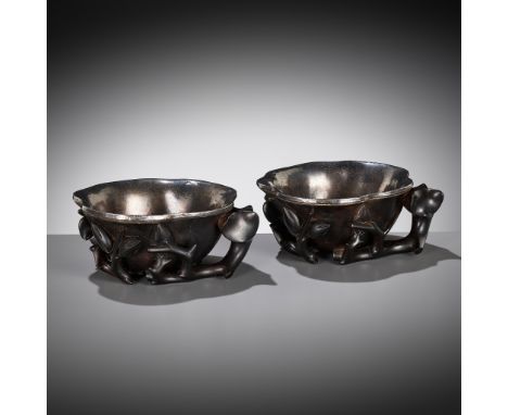 A PAIR OF SILVER-LINED ZITAN 'MAGNOLIA' LIBATION CUPS, CHINA, 18TH CENTURYEach finely carved as a large magnolia flower borne