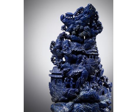 A MONUMENTAL LAPIS LAZULI MOUNTAIN, LATE QING DYNASTYChina, mid-19th to early 20th century. Finely and intricately carved in 