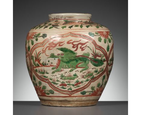 A LARGE AND RARE 'QILIN, MYTHICAL HOUND AND BUDDHIST LION' JAR, MING DYNASTY, JIAJING PERIOD, 1521-1567Expert's note: The com