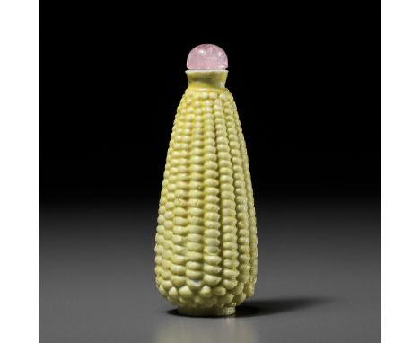 A MOLDED AND YELLOW-GLAZED PORCELAIN 'EAR OF CORN' SNUFF BOTTLE, LATE QING TO REPUBLIC PERIODChina, 1860-1940. The biscuit is