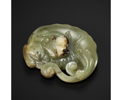 A CELADON AND RUSSET JADE 'CHILONG' WEIGHT, EARLY QING DYNASTYChina, 17th to early 18th century. Of flattened form, the coile