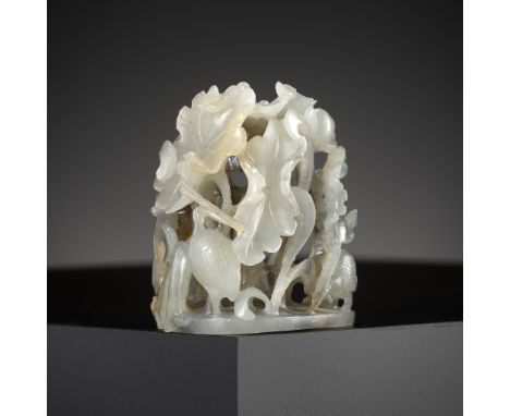 AN OPENWORK JADE COURT HAT FINIAL, YUAN TO MING DYNASTYChina, 1279-1644. Densely carved and pierced with three egrets strutti