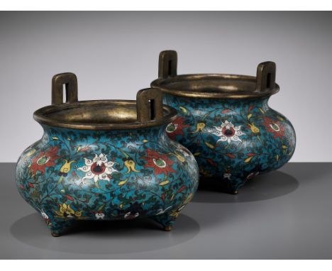 A PAIR OF CLOISONNE ENAMEL BOMBE-FORM TRIPOD CENSERS, EARLY QING DYNASTYChina, 17th - 18th century. Heavily cast, each with a