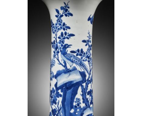 A LARGE BLUE AND WHITE 'PHEASANT' BEAKER VASE, SHUNZHI TO KANGXI PERIODChina, mid-17th to early 18th century. Heavily potted,