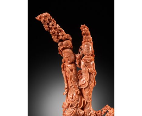 A LARGE CORAL CARVING OF TWO MEIRENChina, early 20th century. Carved in the round with two demurely smiling beauties standing