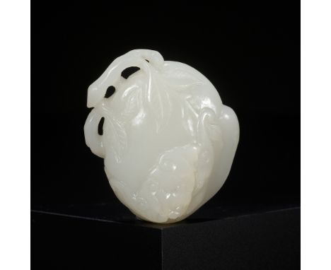 A FINE WHITE JADE 'PEACH AND BAT' PENDANT, QIANLONG PERIODChina, 1736-1795. The flattened peach with a twisting open worked s