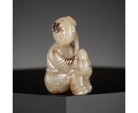 A 'CAT AND BOY' JADE PENDANT, CHINA, 17TH CENTURYSkillfully carved as a boy holding a lingzhi sprig, dressed in long loose ro