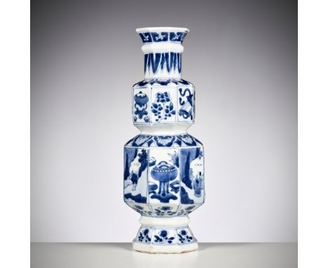 A BLUE AND WHITE OCTAGONAL DOUBLE-GOURD VASE, KANGXI PERIODChina, 1662-1722. Finely painted in shades of cobalt blue, the low