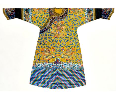 AN IMPERIAL YELLOW-GROUND GAUZE TWELVE-SYMBOL 'DRAGON' ROBE, JIFU, MOST LIKELY MADE FOR THE EMPRESS DOWAGER CIXI, CHINA, c. 1