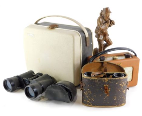 A Grundig projector, a Roberts radio, a pair of Tasco 20x50 binoculars, lacking case, Pentax 8x21 binoculars, Watson &amp; Ba