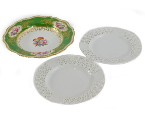 A 19thC English porcelain soup plate, painted with flower sprays, on a green ground with gilt borders, unmarked, 27cm diamete