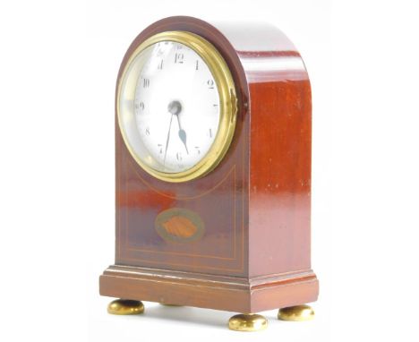 An Edwardian mahogany and inlaid miniature bracket clock, with a French enamel dial, on bun feet, 15cm high.