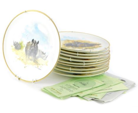 A collection of Wedgwood David Shepherd Wildlife collectors plates, each decorated with African animals.