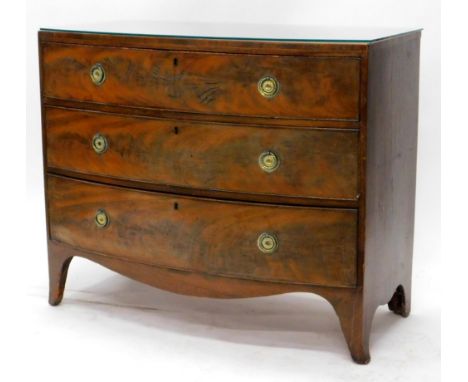 An early 19thC mahogany bow fronted chest of drawers, the caddy top with a crossbanded boxwood strung border, above three gra