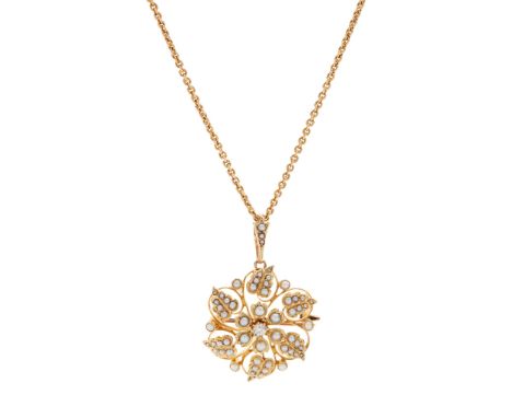 An early 20th-Century seed pearl and diamond necklace of open foliate design, set throughout with seed pearls and a central o