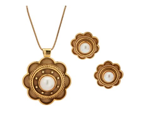 An 18ct gold pearl pendant/brooch and matching earrings each piece of stylised floral design, with a central bouton pearl; th