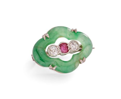 An early 20th-Century jadeite, diamond and ruby brooch millegrain-set with a cushion-cut ruby and two old round-cut diamonds,