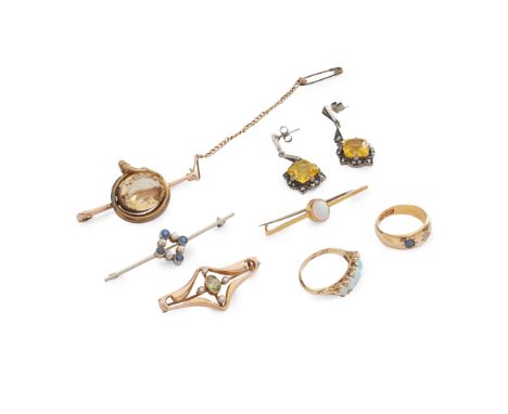 A collection of jewellery including an 18ct gold sapphire and diamond ring, a 15ct gold peridot and seed pearl brooch; an opa