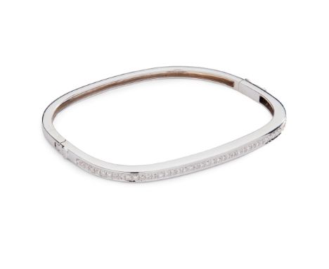 A diamond bangle of hinged design, the front set with a row of round brilliant-cut diamonds, stamped 750(Width: 5.5cm)