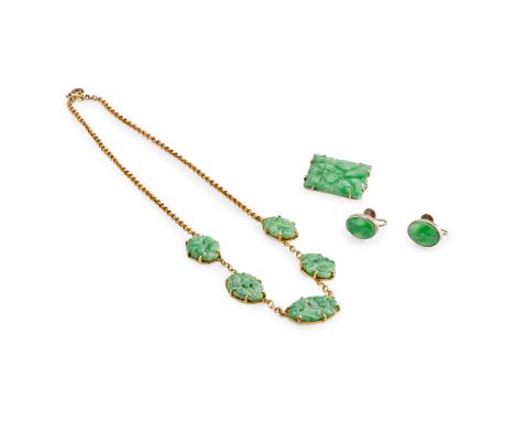 A collection of jade jewellery including a necklace composed of five pierced and carved oval jade panels, to a belcher link c