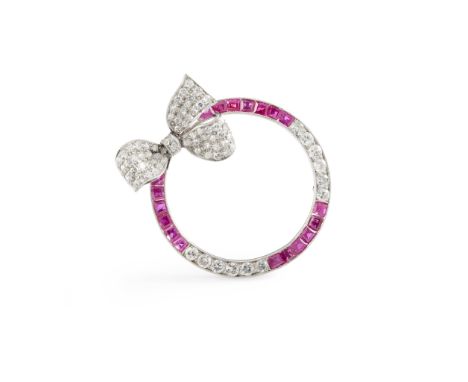 A 1940s ruby and diamond brooch of circular outline, set with calibre-cut rubies and old round-cut diamonds, the applied bow 