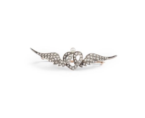 An early 20th-Century diamond and pearl brooch modelled as a winged heart, set throughout with graduated old round and eight-