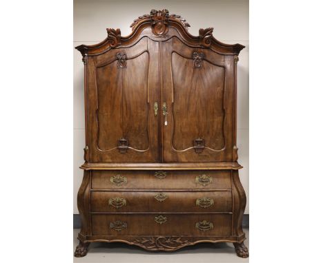 A two-door cabinet, Holland, Louis Seize, 4th quarter 18th century. Mahogany veneered, double curved profiled hood with carve