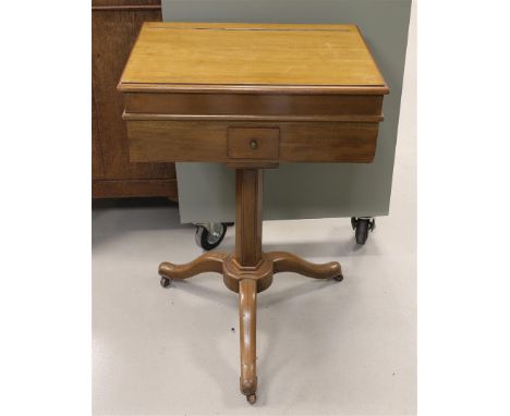 A mahogany sheet music table, Germany, circa 1900. Hinged lid for sheet music, sliding top and drawers, h 76 x w 51 x d 37 cm